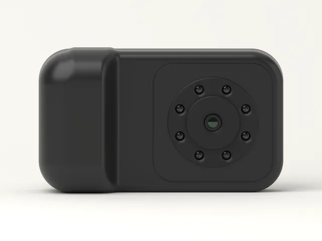 The back of Grennen R1: a small lens inside a ring of lights, on a square panel beside the grip