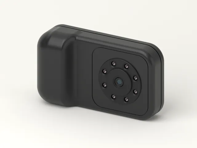 The back of Grennen R1 at an angle, showing the lens panel and the raised grip
