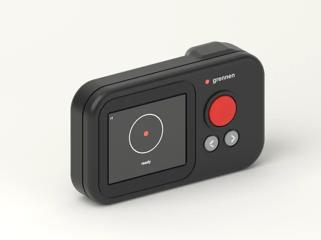 Grennen R1 at an angle from the left, showing the screen and the grennen mark